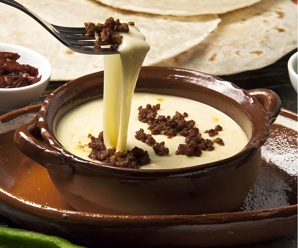 Queso fundido con chorizo